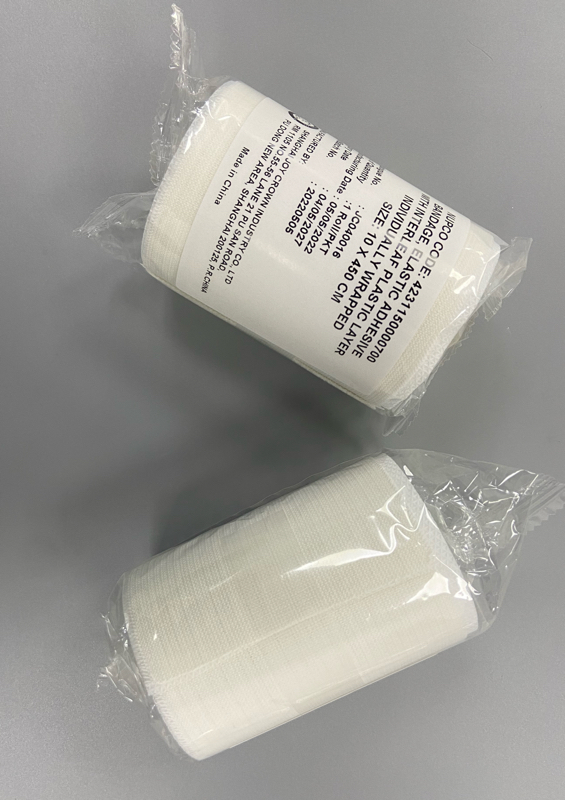 Adhésif élastique de bandage hypoallergénique avec la couche en plastique d'Interleaf